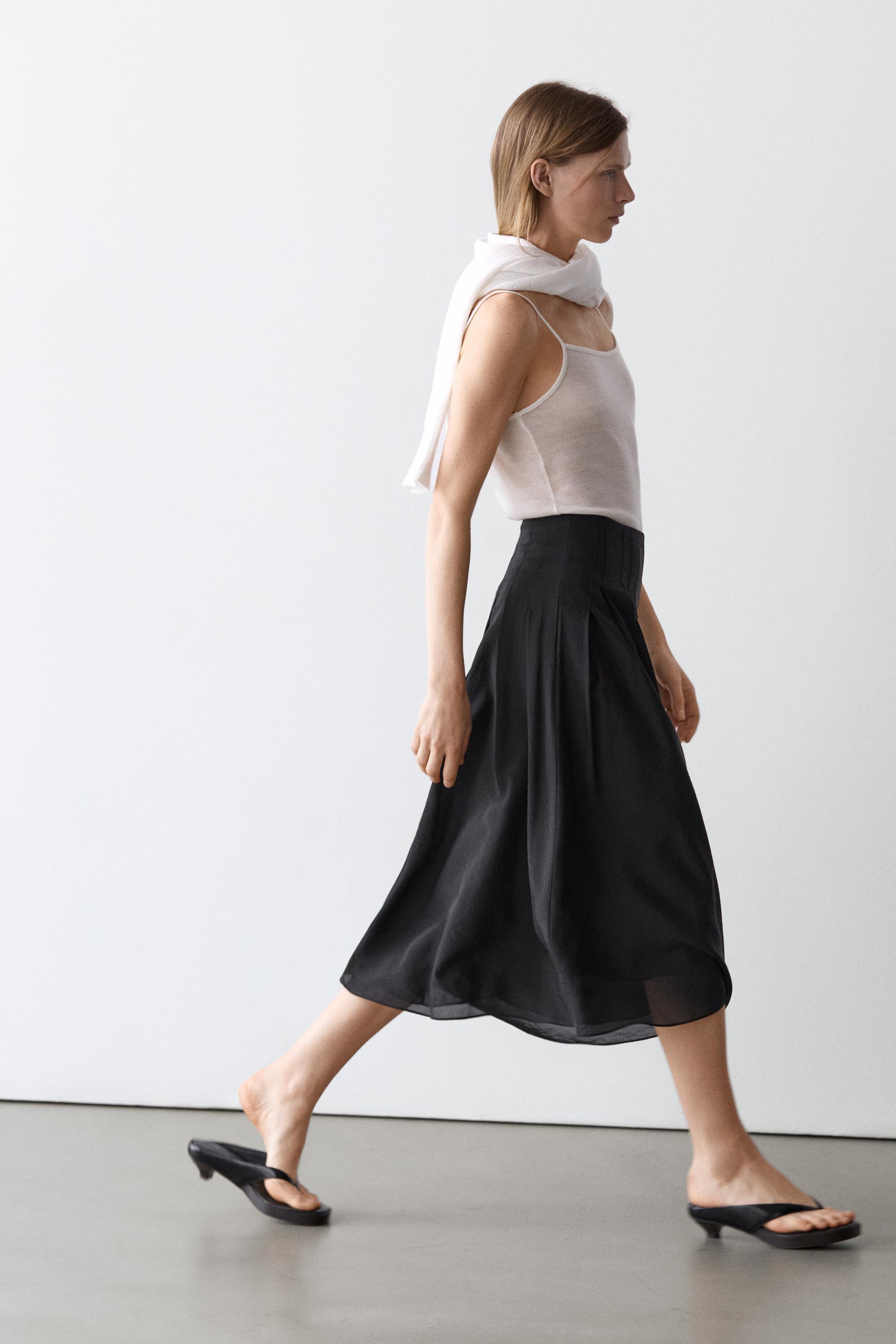 Flowing midi skirt with pintucks